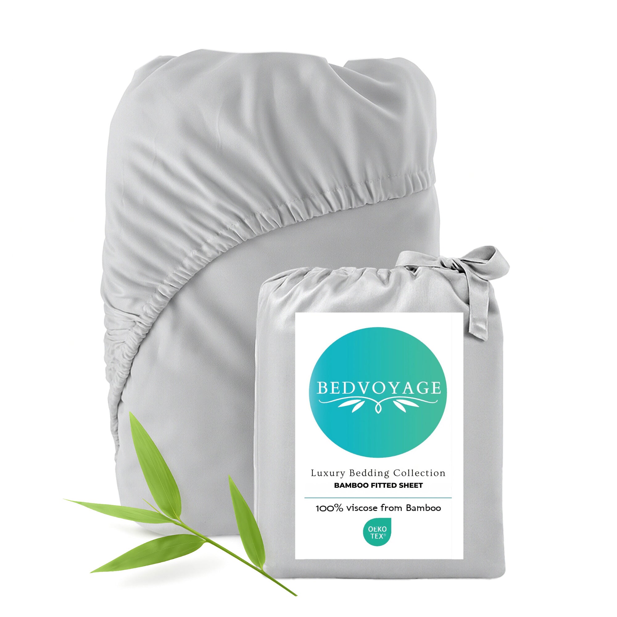 Gray fitted sheet with Bedvoyage packaging and a green leaf on a white background